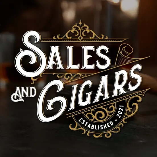 Decorative "Sales and Cigars" logo with ornate gold design elements, established in 2021, highlighting a sophisticated theme with a vintage-inspired font.